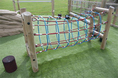 A display of a rope net on a child's playground