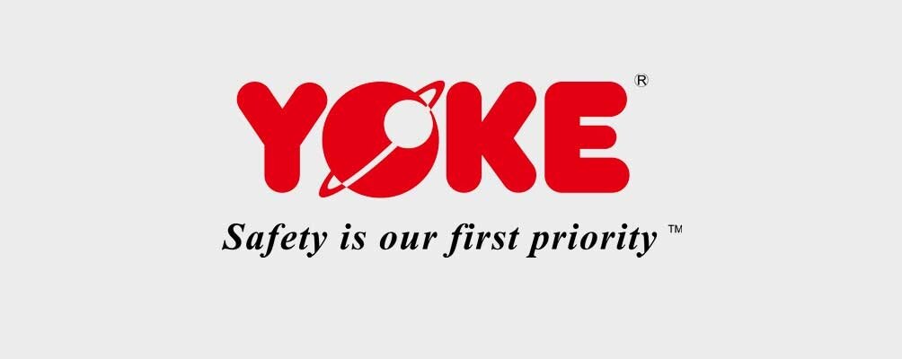 YOKE Logo A red logo of the word YOKE and the slogan Safety is our first priority