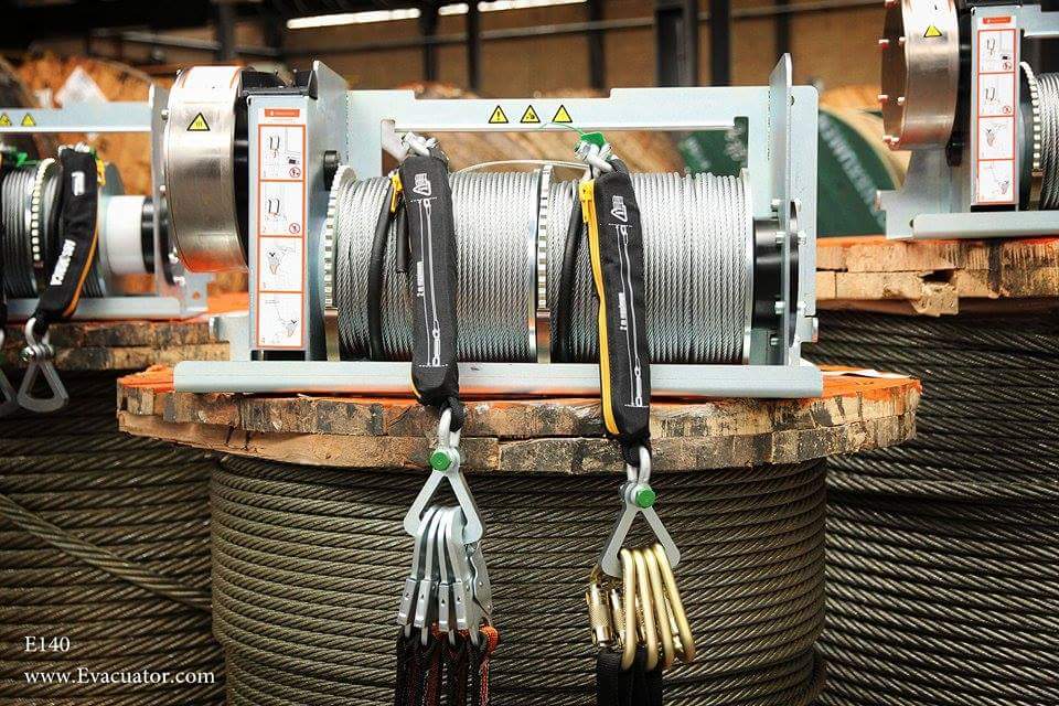 The Evacuator The Evacuator product displayed without it's outer casing placed on some steel wire rope reels