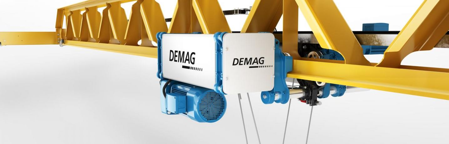 Demag Hoist Demag hoist in blue and grey suspended from a yellow metal girder