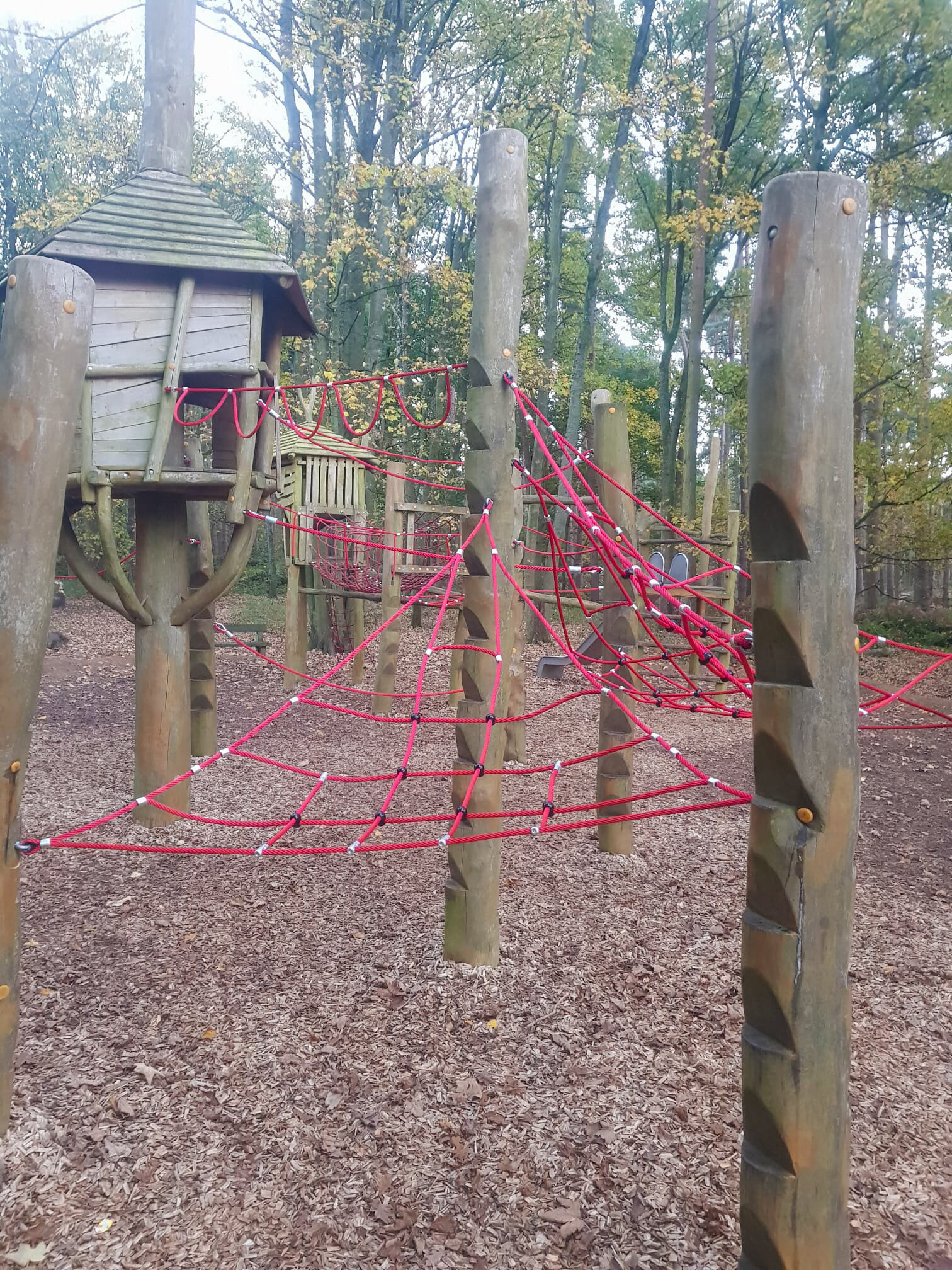 Large adventure-style rope climbing structure for active outdoor playground